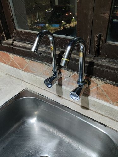 Customer photo review of Ecofriendly Limescale Remover/Descaler for taps, Hard Water Stains,  Showers ,faucets & bathroom Tiles-500ml