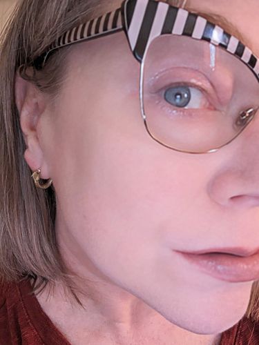 Customer photo review of Ouroboros Earrings