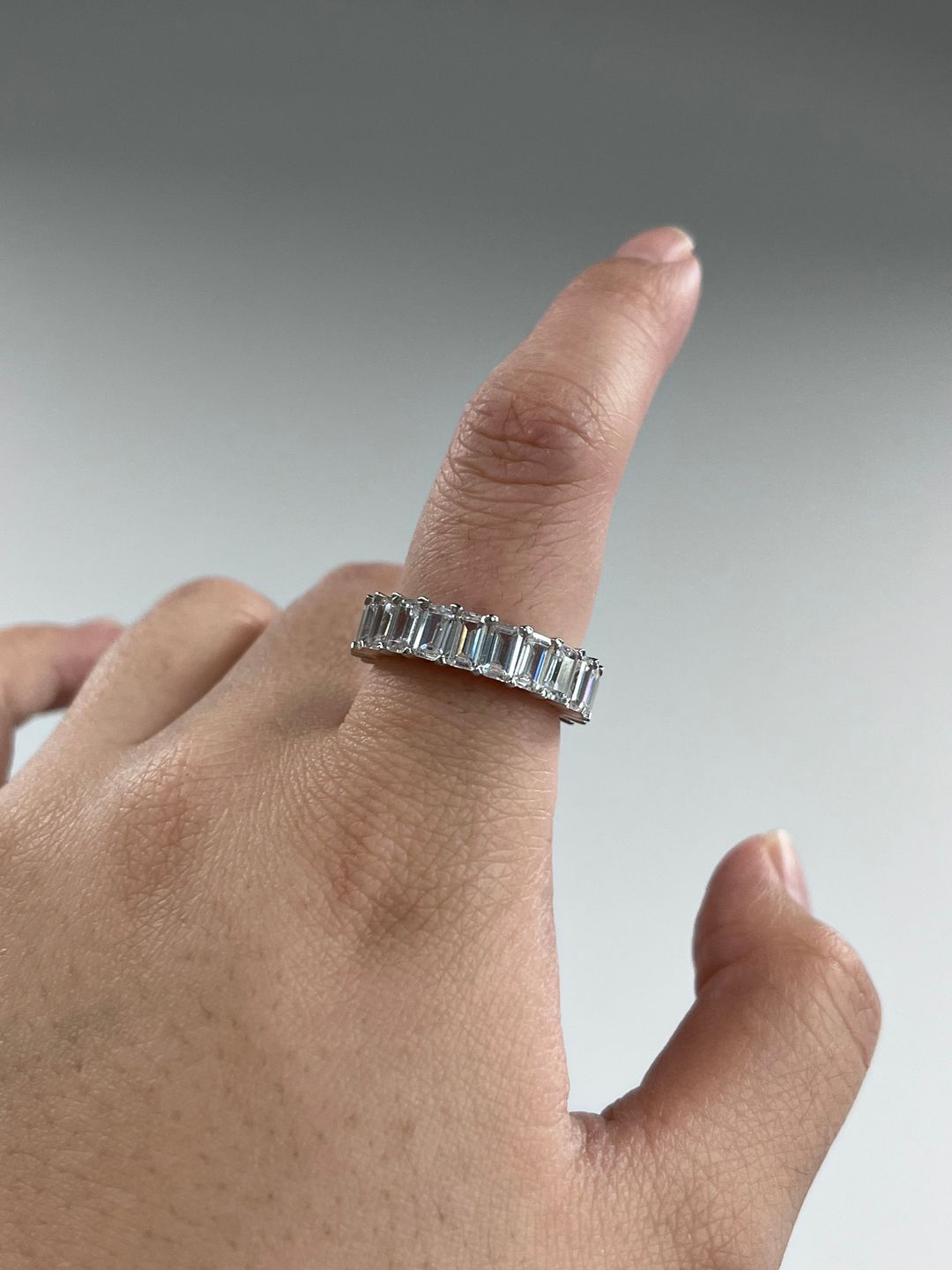 Customer photo review of Louily Eternity 5 Ct Emerald Cut Women's Wedding Band In Sterling Silver