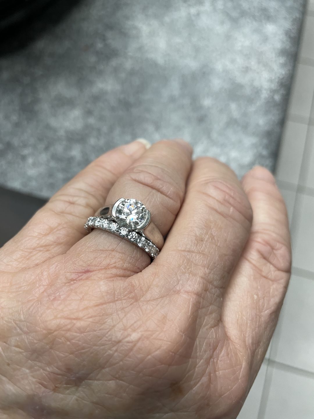 Customer photo review of Pave Moissanite Eternity Wedding Band Ring In Sterling Silver
