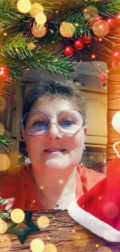 Customer photo review of Boucles d'Oreilles Père Noël Asymétriques