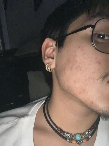 Customer photo review of Ouroboros Earrings