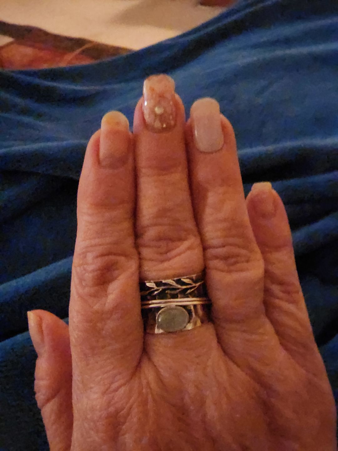 Customer photo review of Aquamarine Leaf Spinner ring Sterling Silver