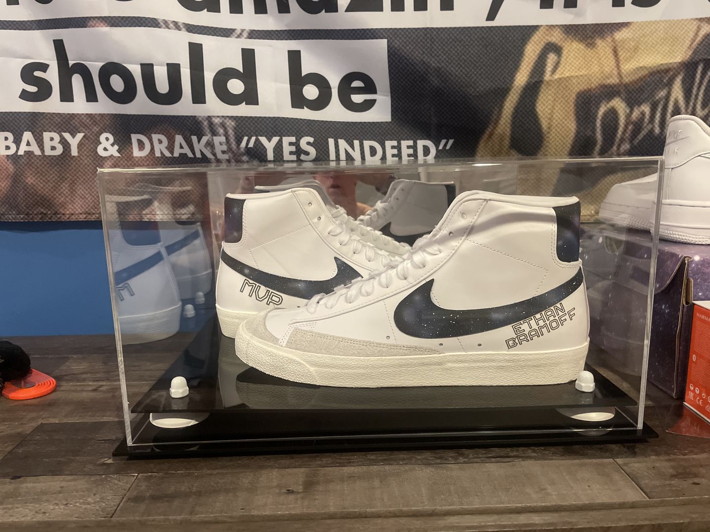 Customer photo review of Large Display Case for Basketball Shoes, Sneakers, Lacrosse, Soccer & Football Cleats Mirror No Wall Mounts