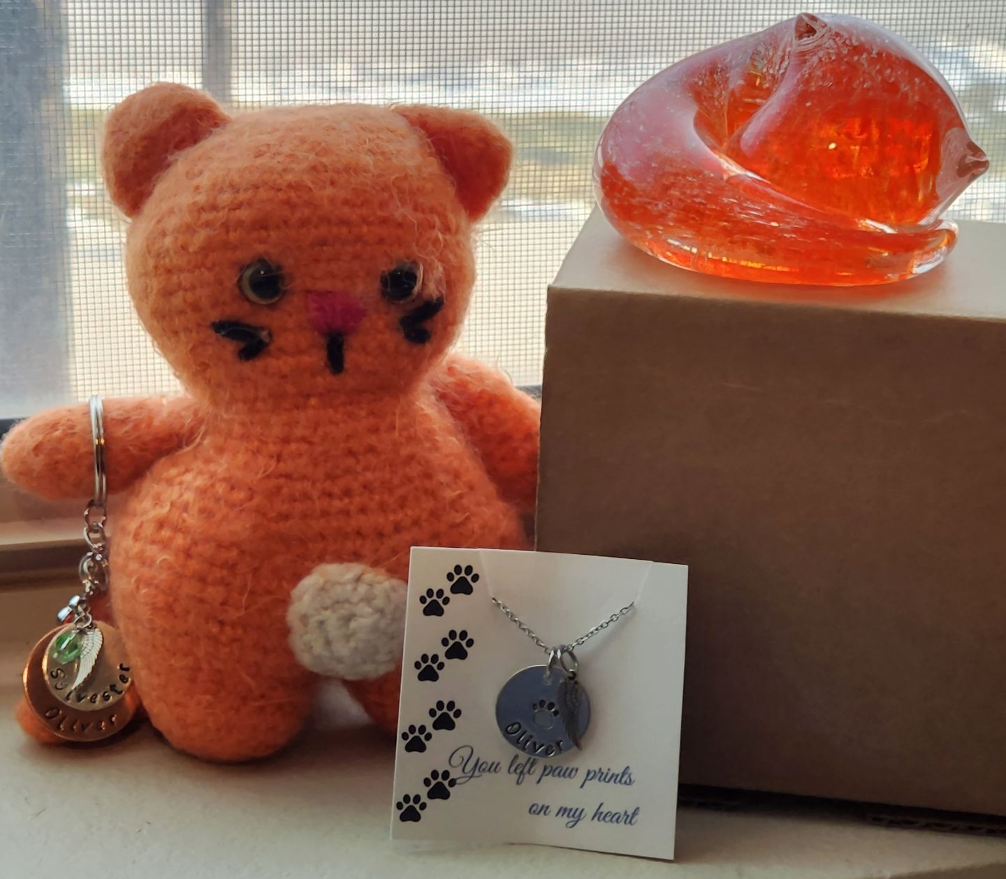Customer photo review of Half-tone Sleeping Glass Cat with Infused Cremation Ashes