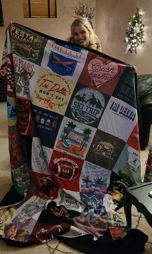 T-shirt quilt with travel, family gatherings themes by Ann from NE