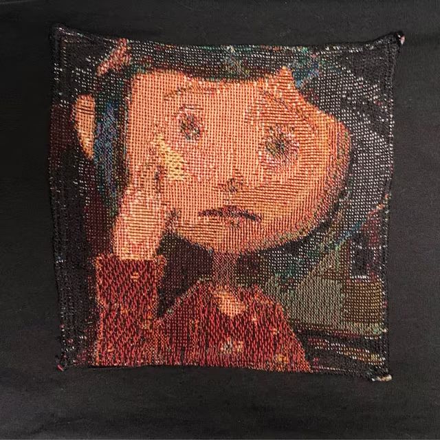 Customer photo review of Coraline Tapestry Tee