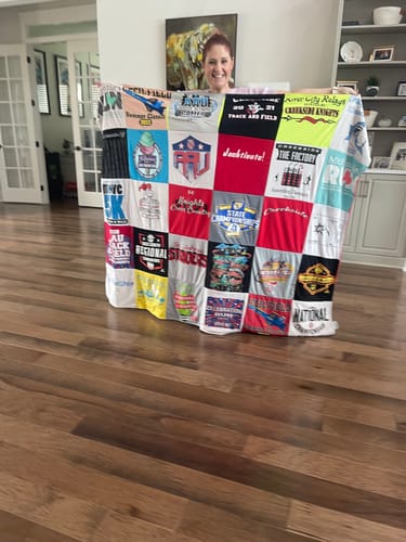 T-shirt quilt with sports, hockey themes by Liz from FL