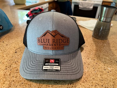 Customer photo review of Custom Leather Patch Trucker Hat - Richardson 112