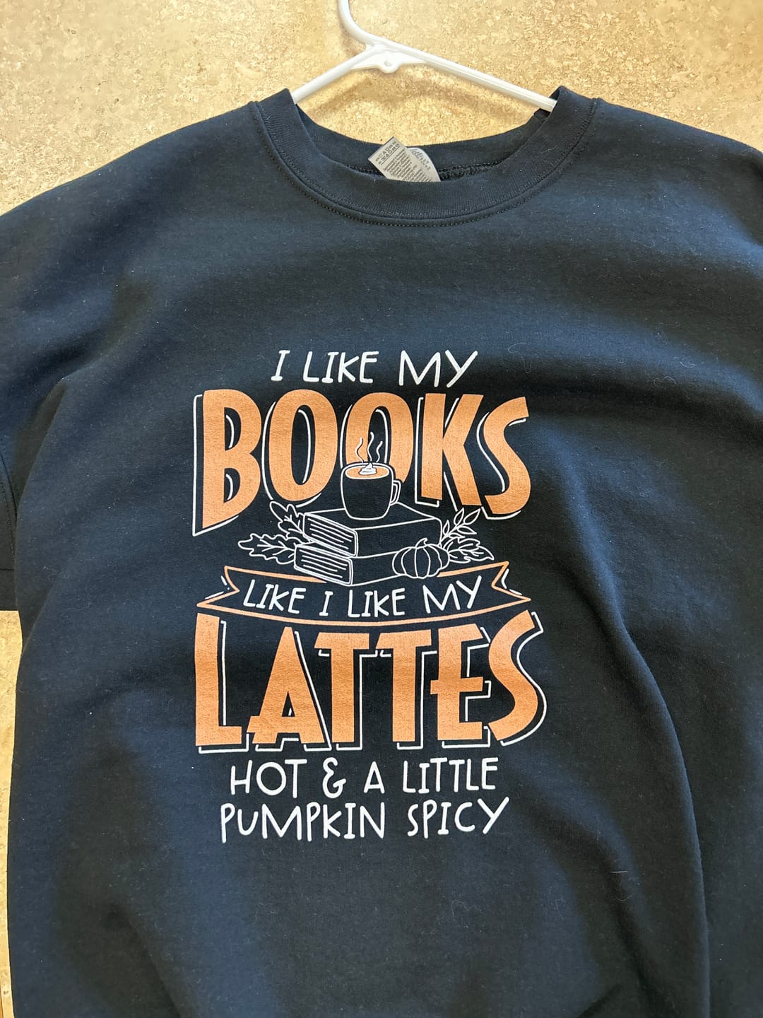 Customer photo review of i like my books like i like my lattes sweatshirt