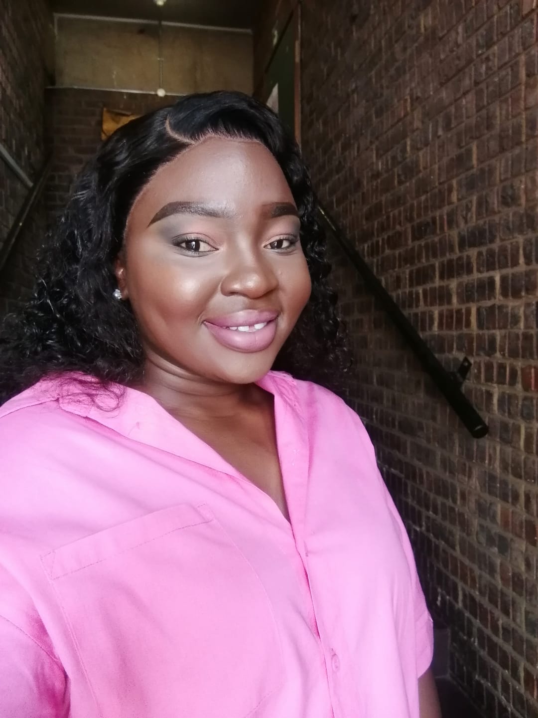 Customer photo review of Gorgeous 20-inch Malaysian Long Curly Wig with Lace Closure - Premium Human Hair