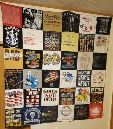T-shirt quilt with military service, veteran support themes by Lawrence from MI