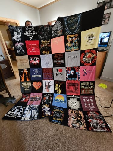 T-shirt quilt with music, travel themes by Sonya from IL