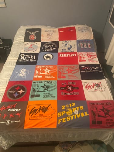 T-shirt quilt with sports, gymnastics themes by Eileen from OH