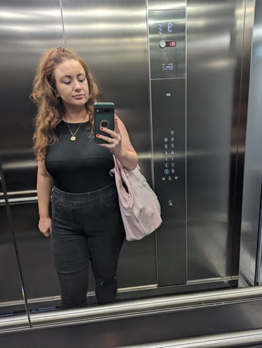 Customer photo review of Medallion Zodiac Necklace