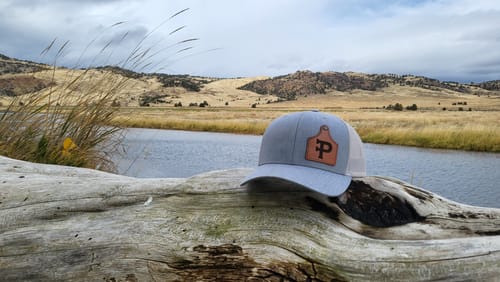 Customer photo review of Ear Tag Custom Leather Patch Trucker Hat - Richardson 112