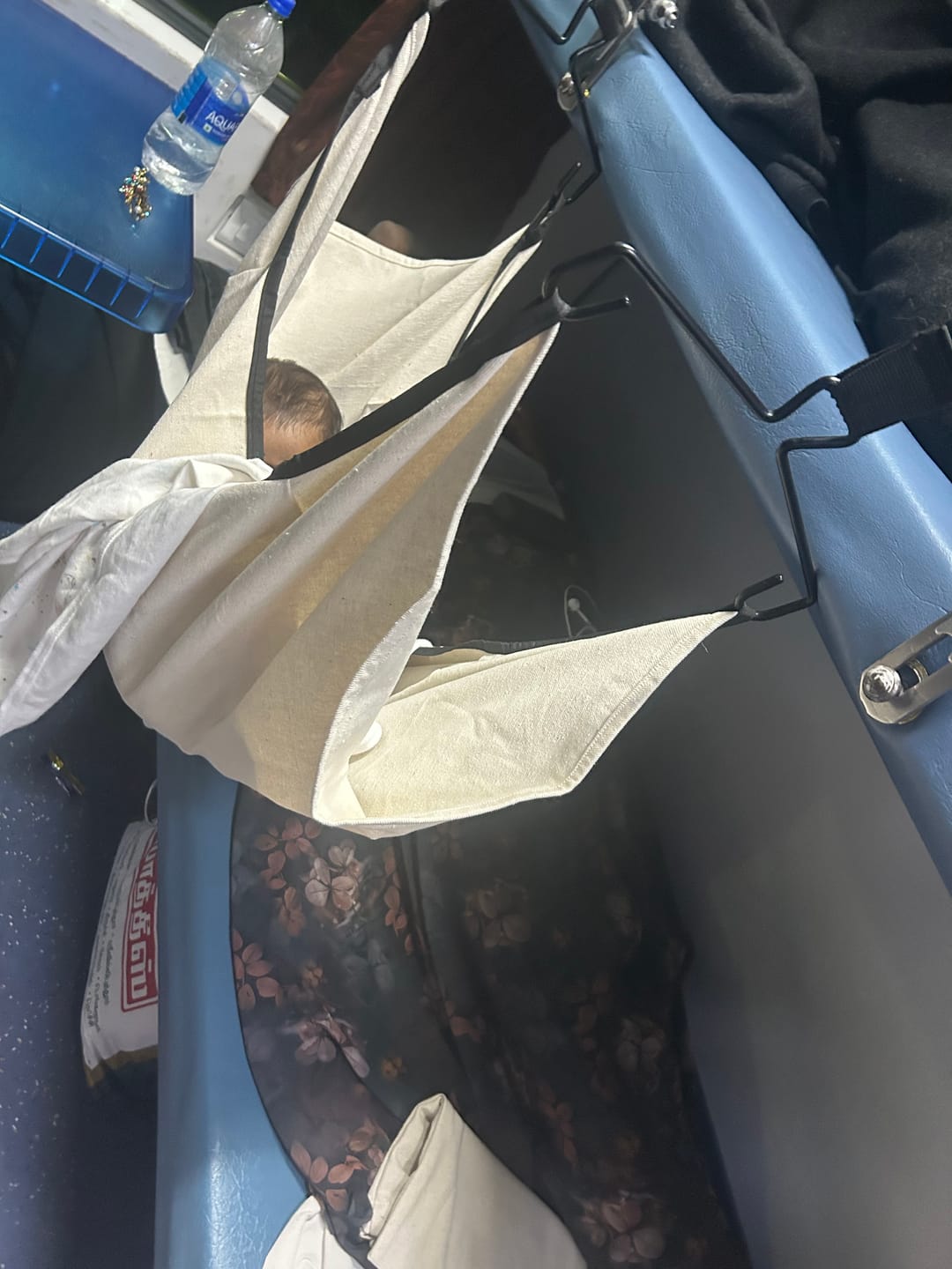 Customer photo review of CarNap - Portable Car Hammock for 0 to 3 year baby | with Adjustable Belt, Hammock Cloth, Hangers and Carry Bag