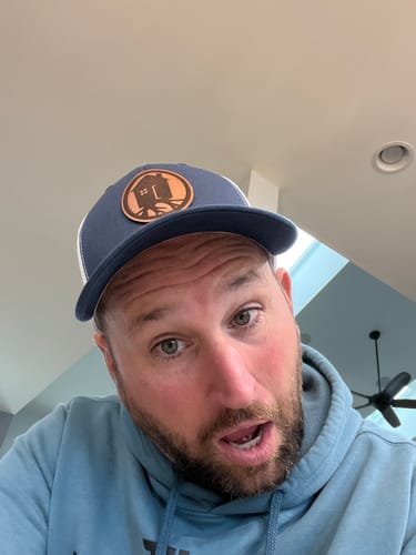 Customer photo review of Custom Leather Patch Trucker Hat - Yupoong 6606