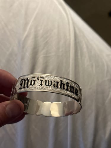 Customer photo review of Sterling Silver Custom-Made Plumeria King Scroll Black Enamel Raise Letter Cut Out Edge Bangle (Heavy 1.75)