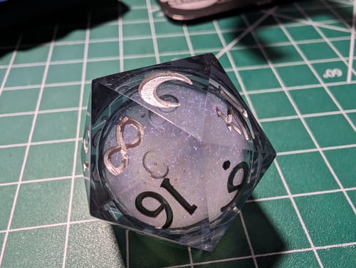 Customer photo review of Dark Blue Liquid Core Resin Galaxy Dice Moon DnD D&D Dice Set
