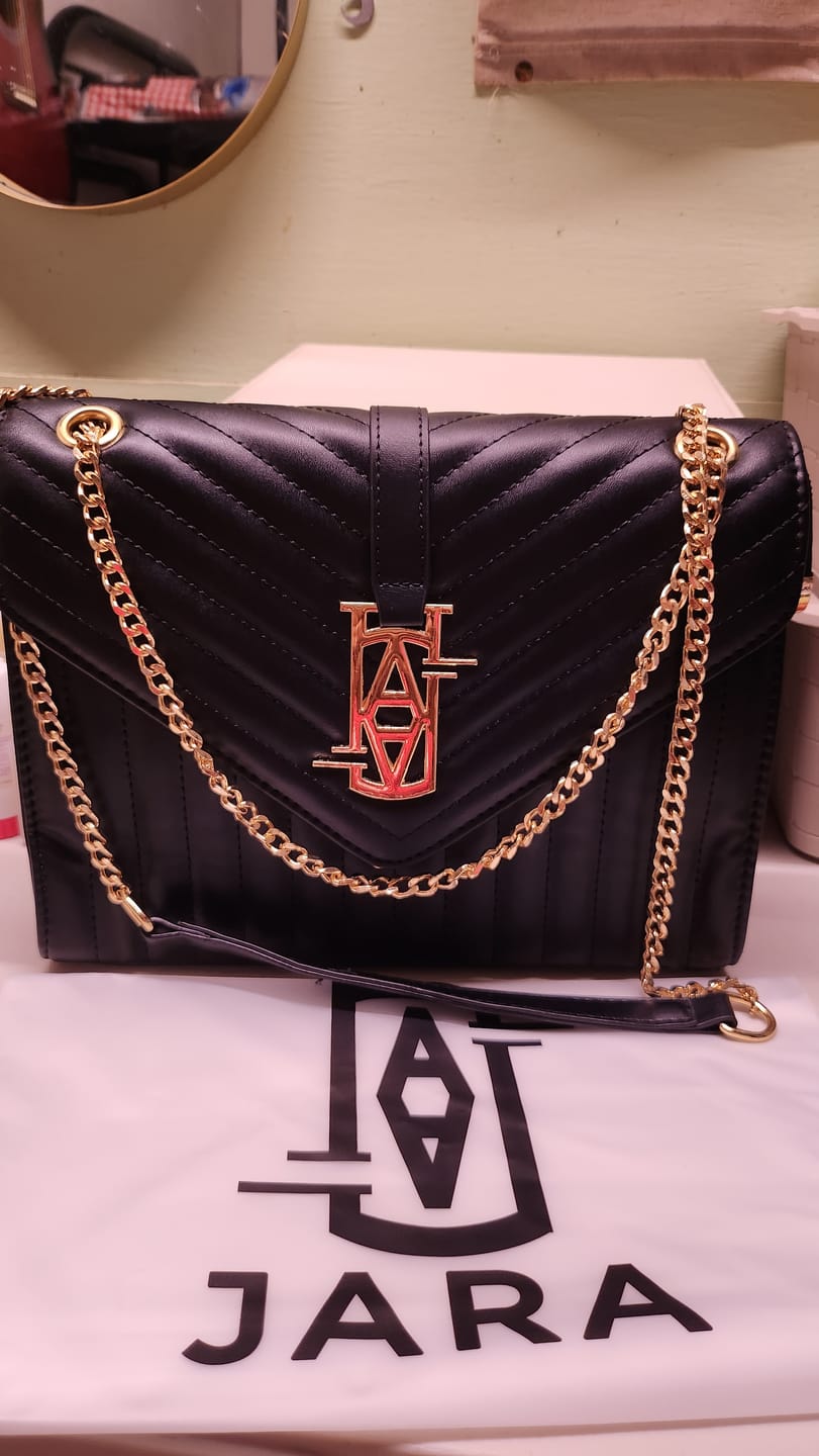 Customer photo review of MADRID LEATHER ENVELOPE BAG