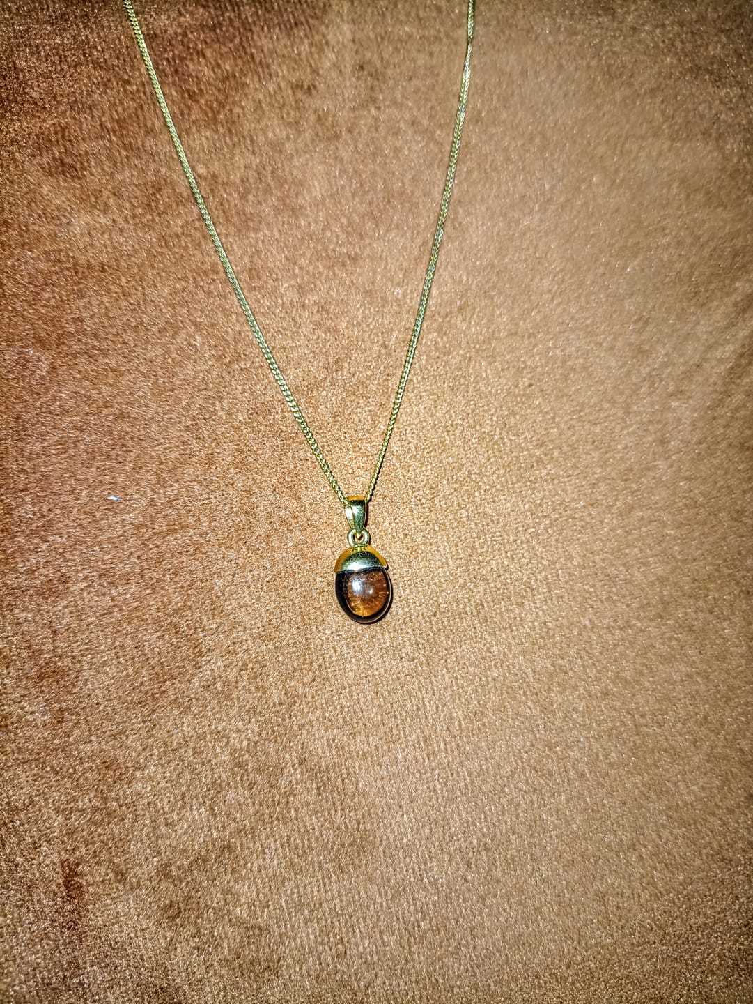 Customer photo review of Berlock Trumlad Rökkvarts Guld