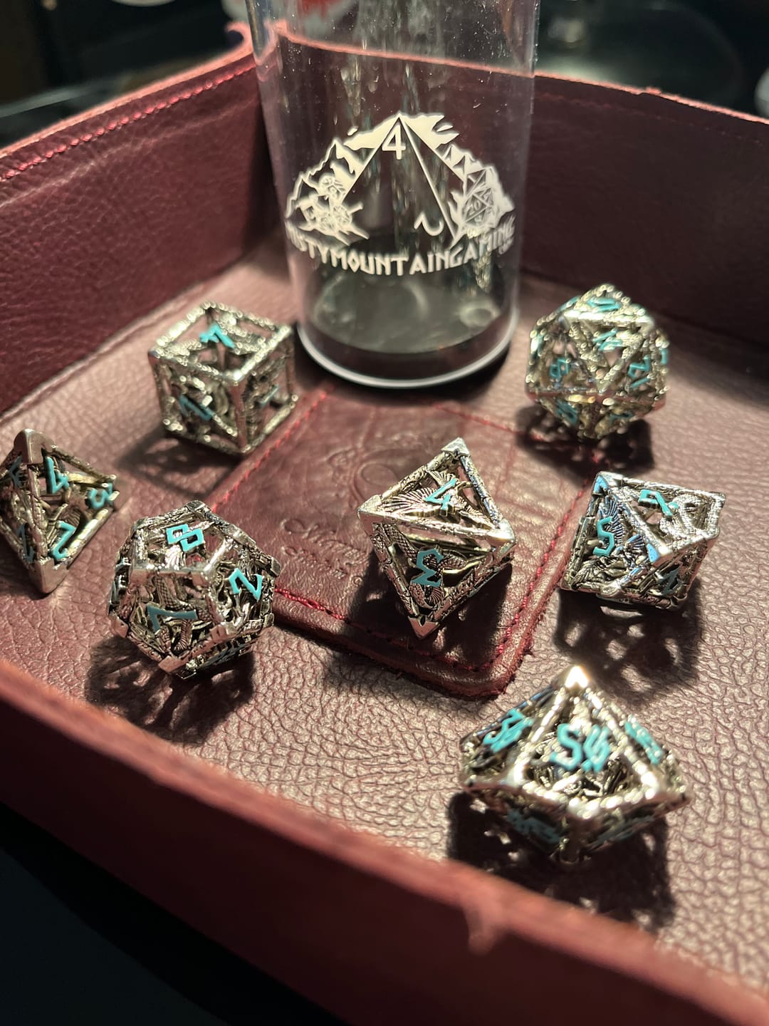Customer photo review of Legends of Valhalla - Silver and Blue Hollow Metal Dice Set