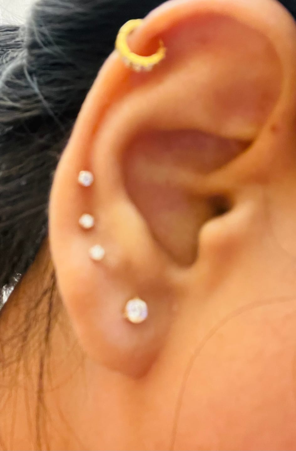 Customer photo review of 14K Yellow Gold Classic Solitaire Stud Earrings