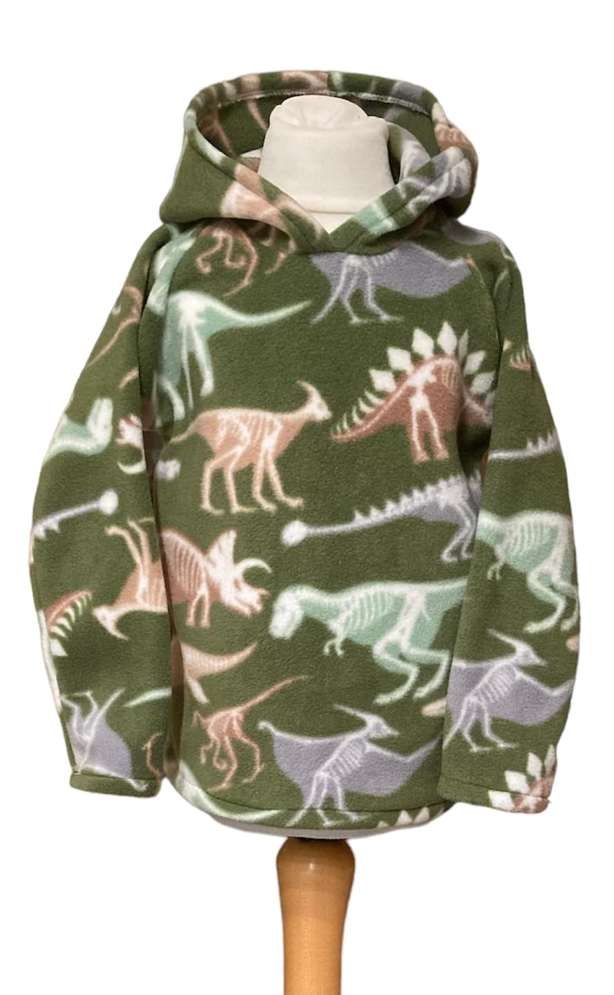 Customer photo review of Dino Skeletons on Green Anti Pill Polar Fleece Fabric