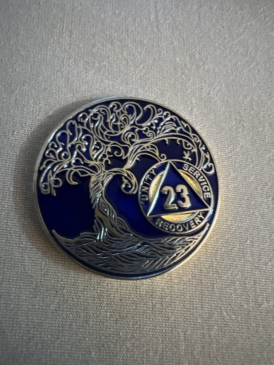 Customer photo review of 23 Year Sobriety Mint Twisted Tree of Life Gold Plated AA Recovery Medallion - Twenty Three Year Chip/Coin - Blue