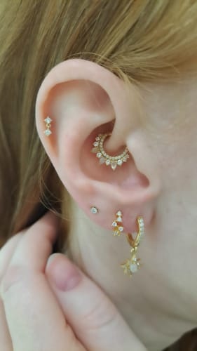 Customer photo review of CHLUXE • MAIA Moonstone Daith Hoop - 14K Yellow Gold