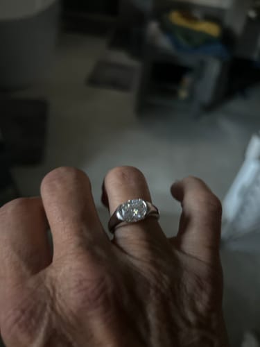 Customer photo review of Solitaire Oval Moissanite Half Bezel Set Engagement Ring