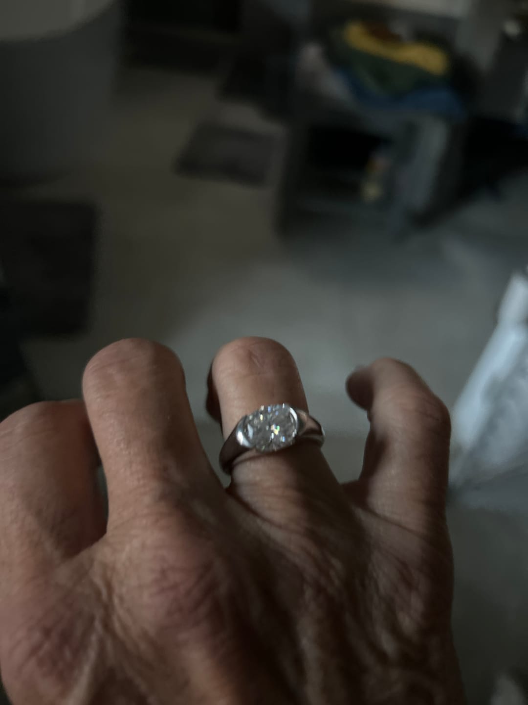 Customer photo review of Solitaire Oval Moissanite Half Bezel Set Engagement Ring
