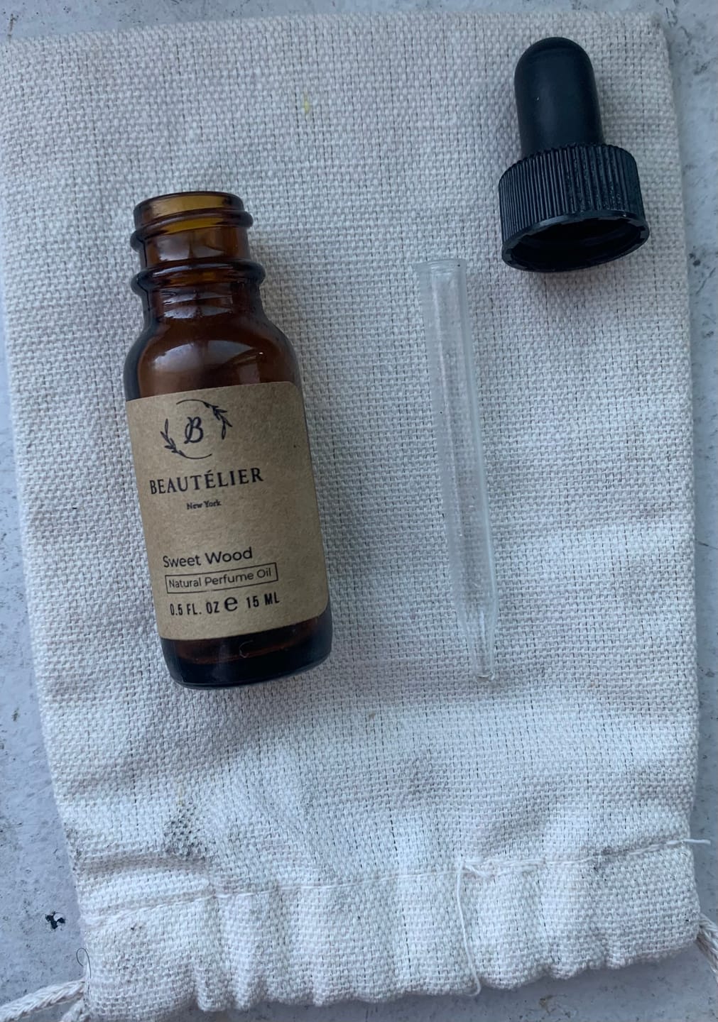 Customer photo review of Sweet Wood Perfume Oil