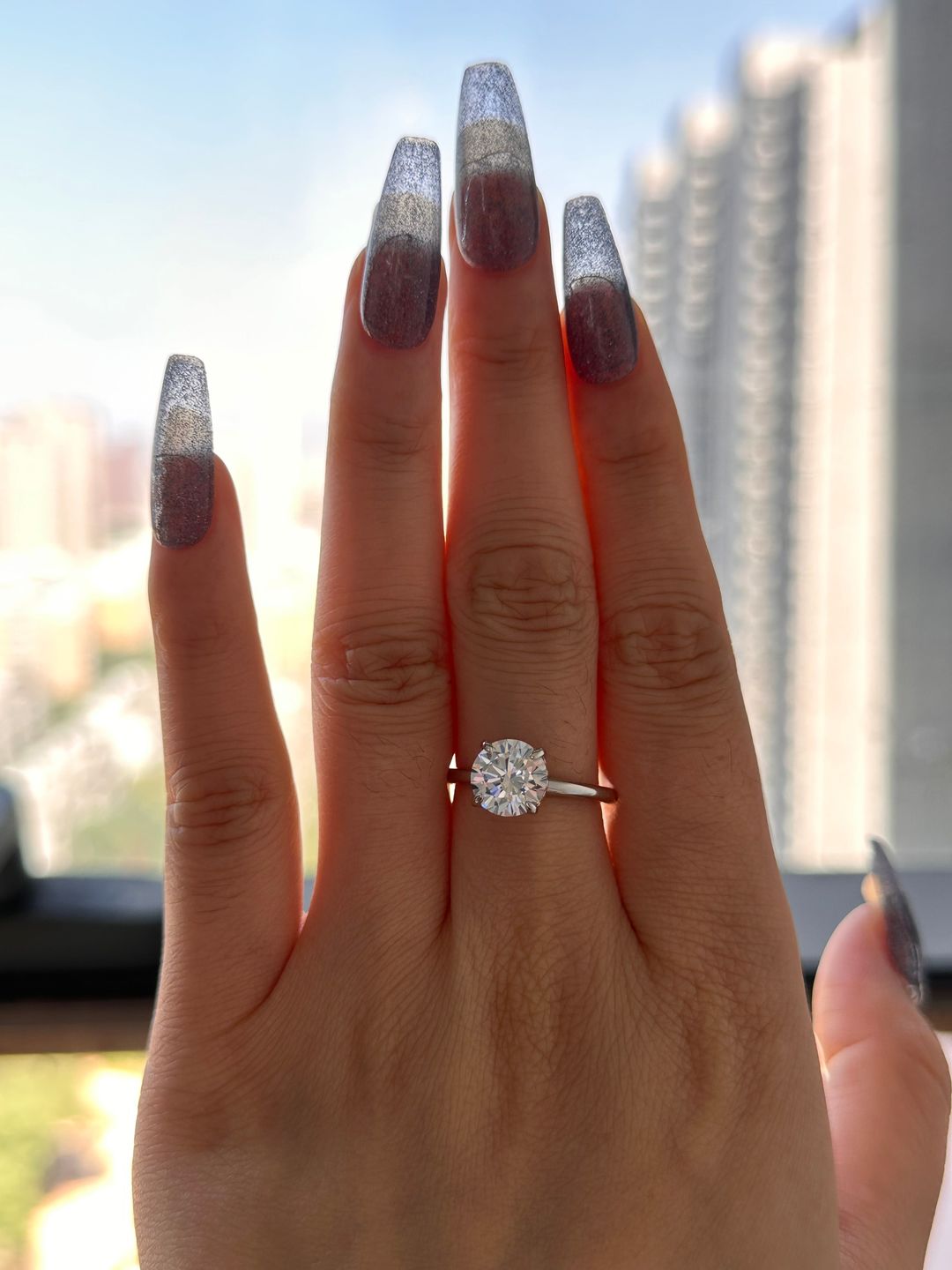 Customer photo review of Louily Classic Round Cut Engagement Ring For Women In Sterling Silver