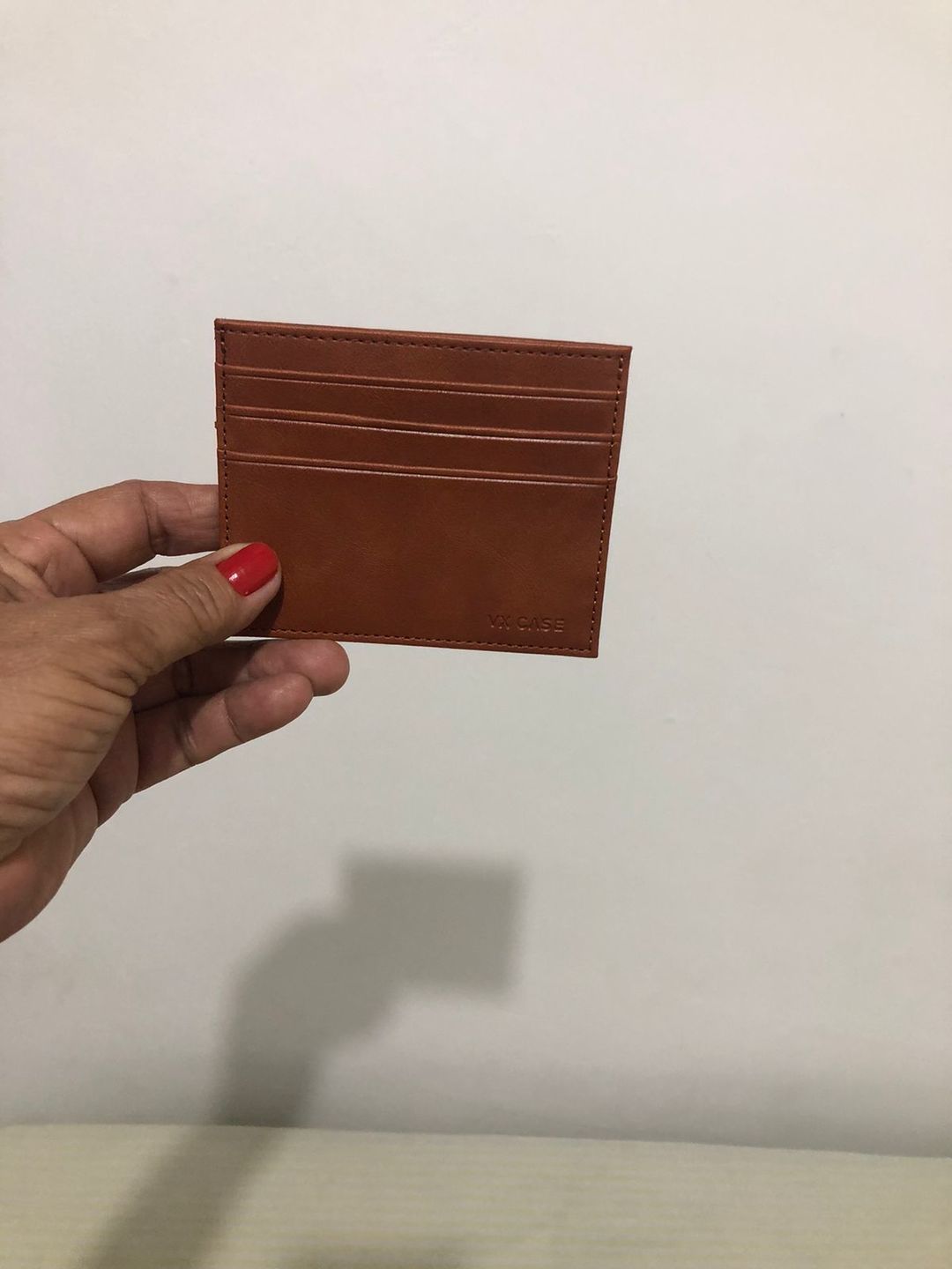 Customer photo review of Porta Cartão VX Case