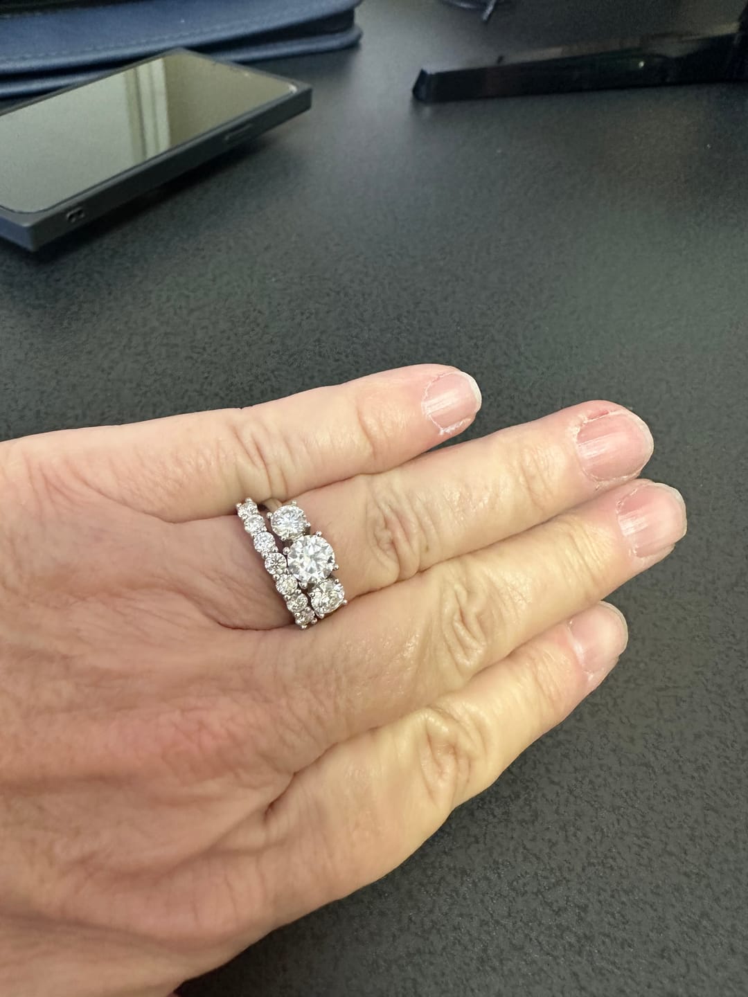 Customer photo review of Classic Three Stone Round Cut Moissanite Sterling Silver Wedding Ring
