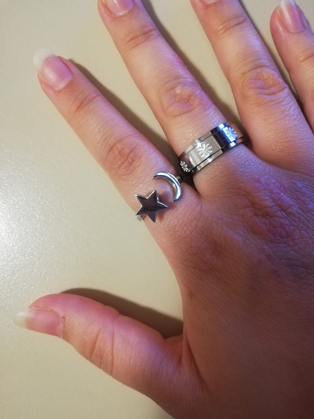 Customer photo review of silver daisy icon spinning anxiety ring