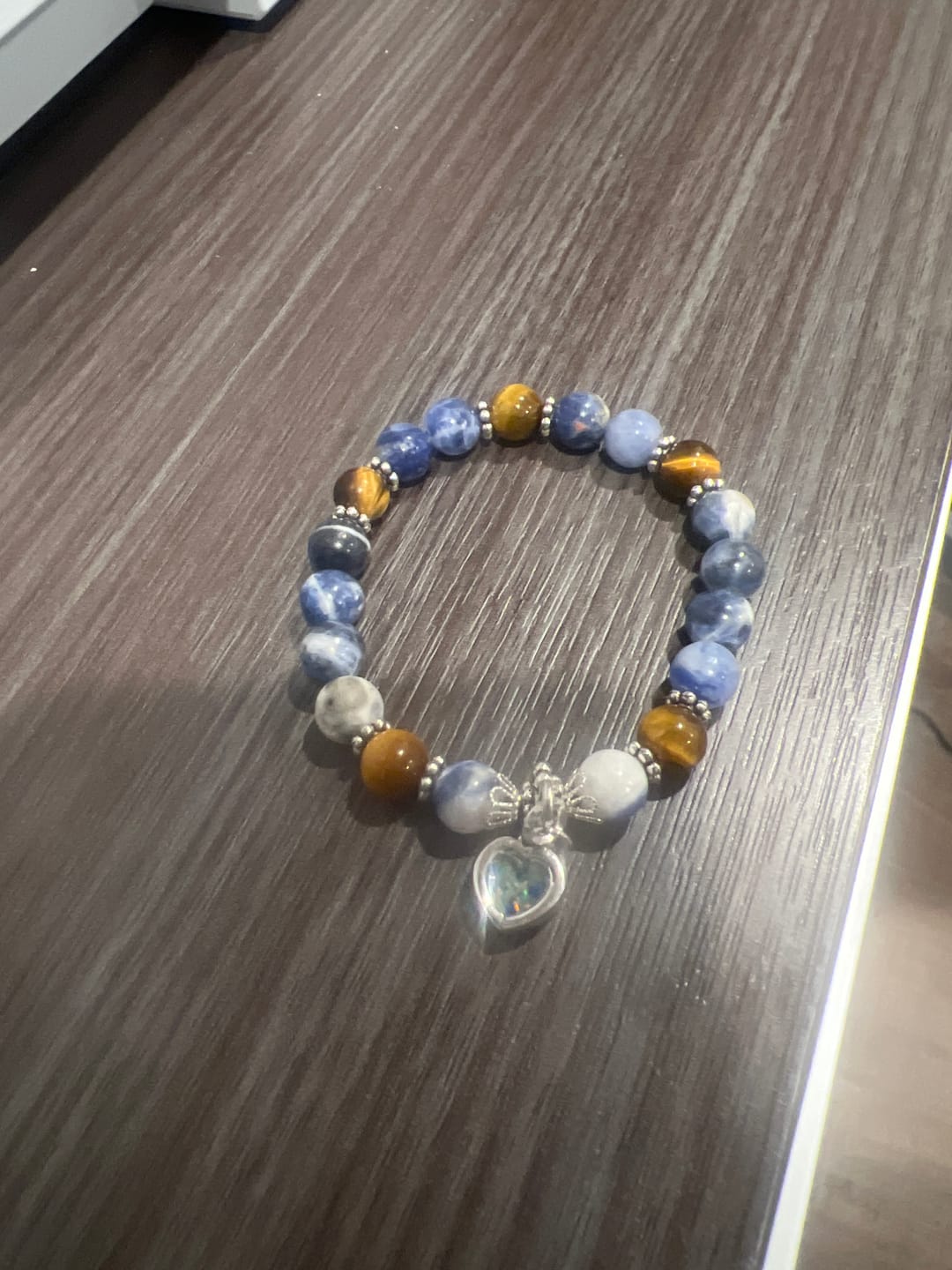 Customer photo review of Sodalite and Tiger Eye Healing Bracelet with Cremation Ashes