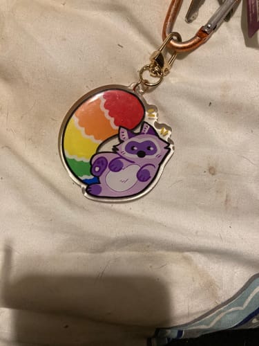Customer photo review of Pride Raccoon Acrylic Keychain
