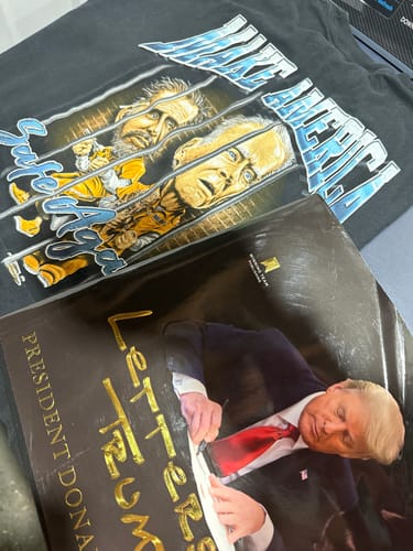 Customer photo review of Make America Safe Again Premium Tee