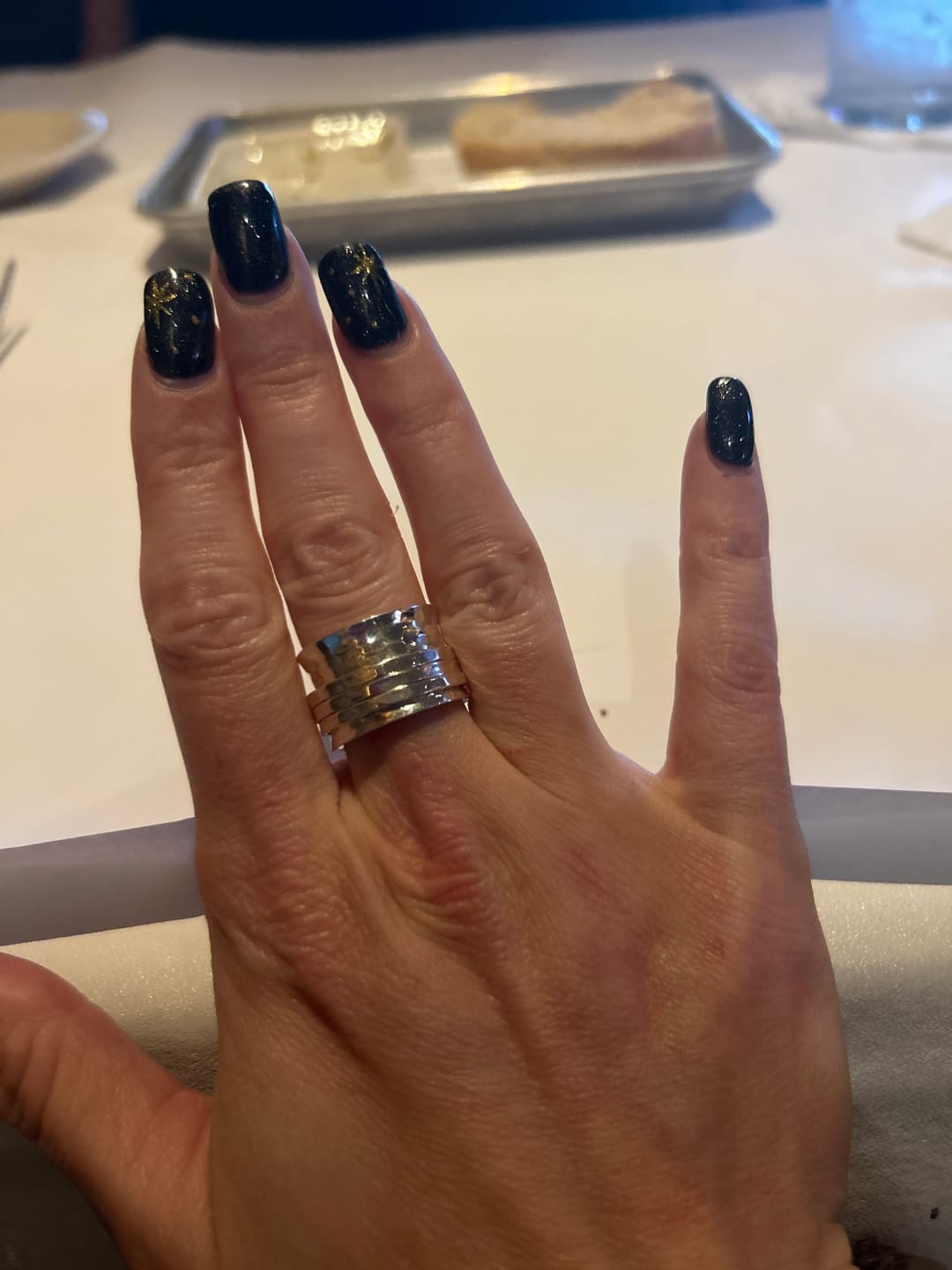 Customer photo review of Wide Band Silver Spinner Ring
