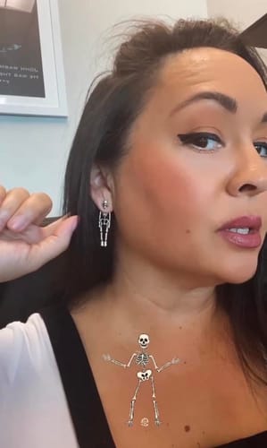 Customer photo review of Just Love Skulls Earrings
