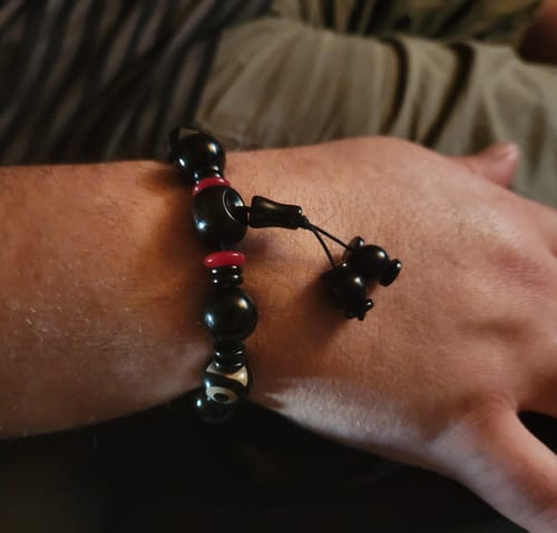 Customer photo review of Buddha Stones Tibetan Three-eyed Dzi Bead Luck Protection Bracelet