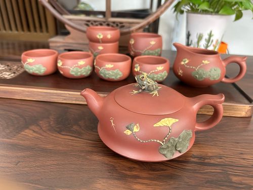 Customer photo review of Handmade Yixing Red Clay Lotus Tea Set