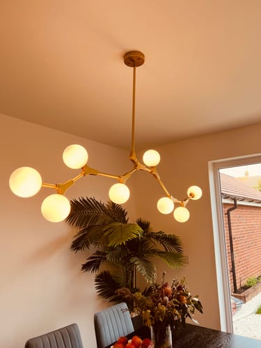 Customer photo review of Modern 8-Light Brass Sphere Chandelier