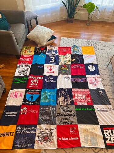 T-shirt quilt with education, community service themes by Gail from NY