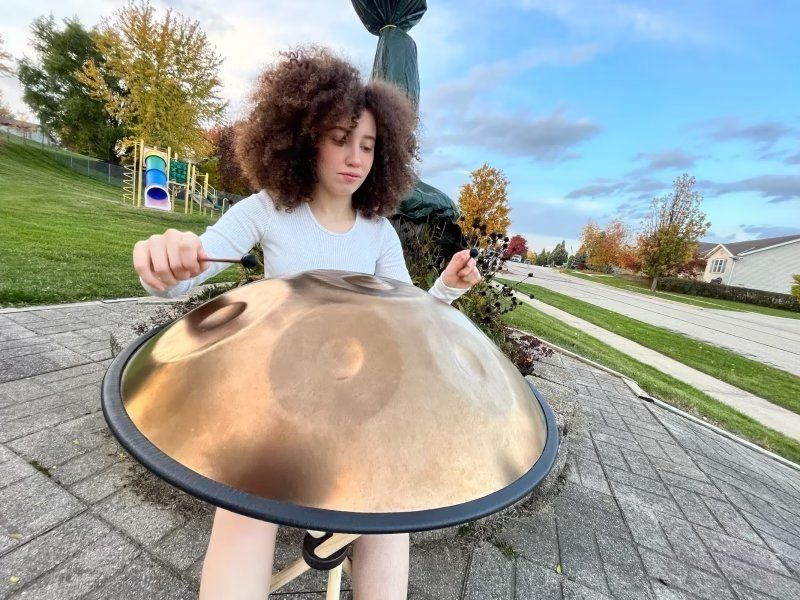 Customer photo review of Cosmos Handpan - Pure Golden 9/10/12 Notes D Minor Tambourine - Gift Set
