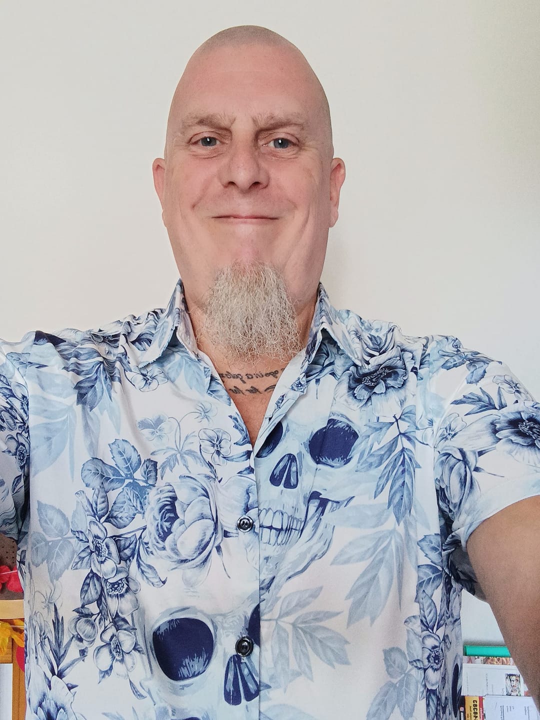 Customer photo review of Men's Skull Floral Print Casual Lapel Button Short Sleeve Shirt