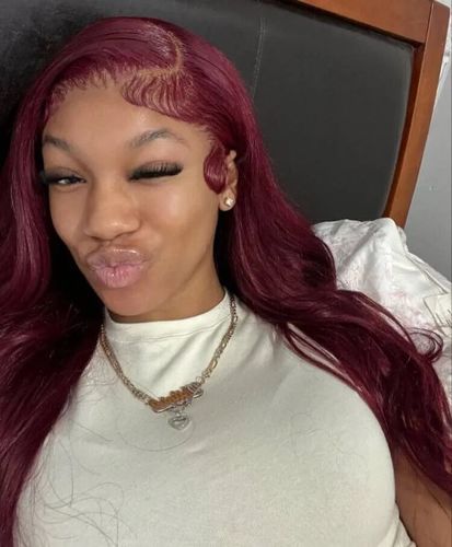 Customer photo review of Vibrant Burgundy Lustrous Silky Straight Lace Frontal Wig